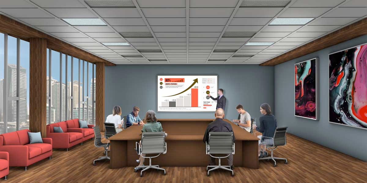 Digital representation of a conference room with people sitting around a table and someone presenting at a screen